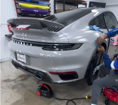 Installer applying Paint Protection Film